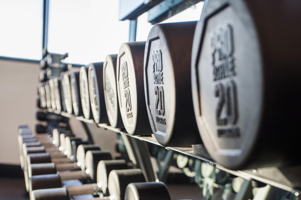 Fv By Peppers Aparthotel Brisbane Exterior photo Dumbbells on a rack