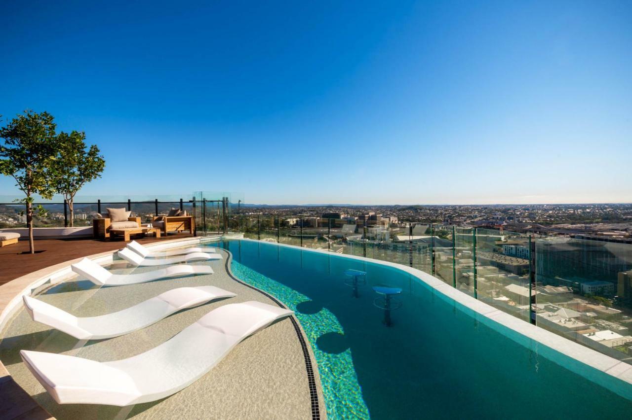 Fv By Peppers Aparthotel Brisbane Exterior photo Skyline Residences rooftop pool