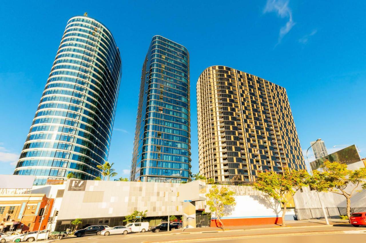 Fv By Peppers Aparthotel Brisbane Exterior photo The three towers of the complex